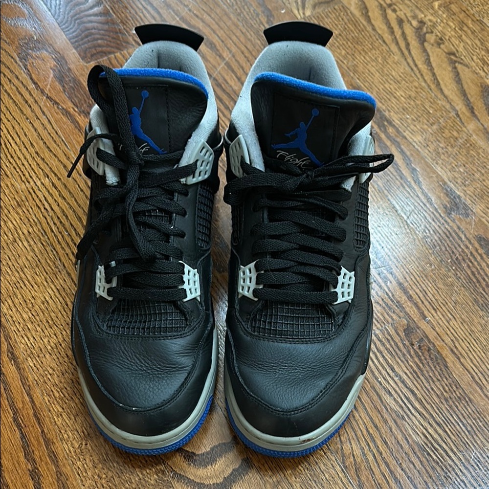 Black and Blue High-Top Sneakers with Air Cushioning